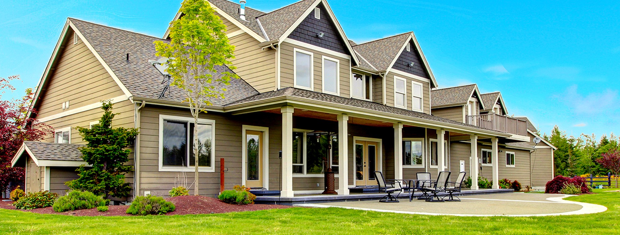 A country home with a wide green lawn in western Wisconsin